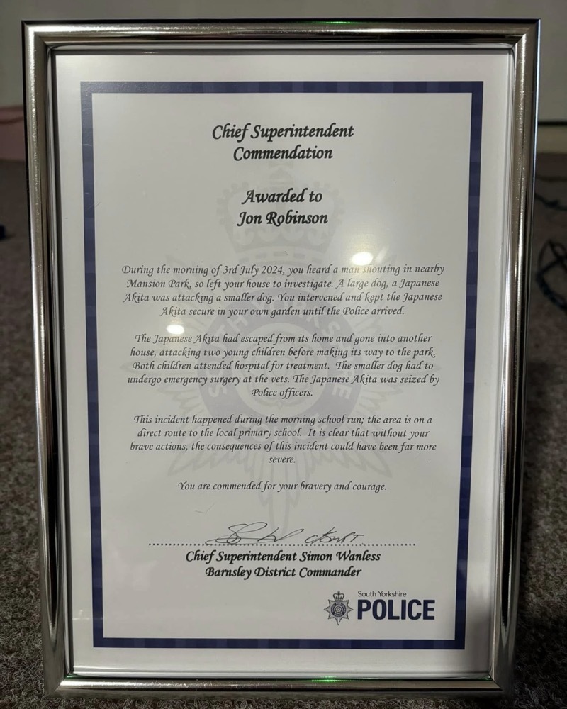 Other image for Jon fought off dog to win police award